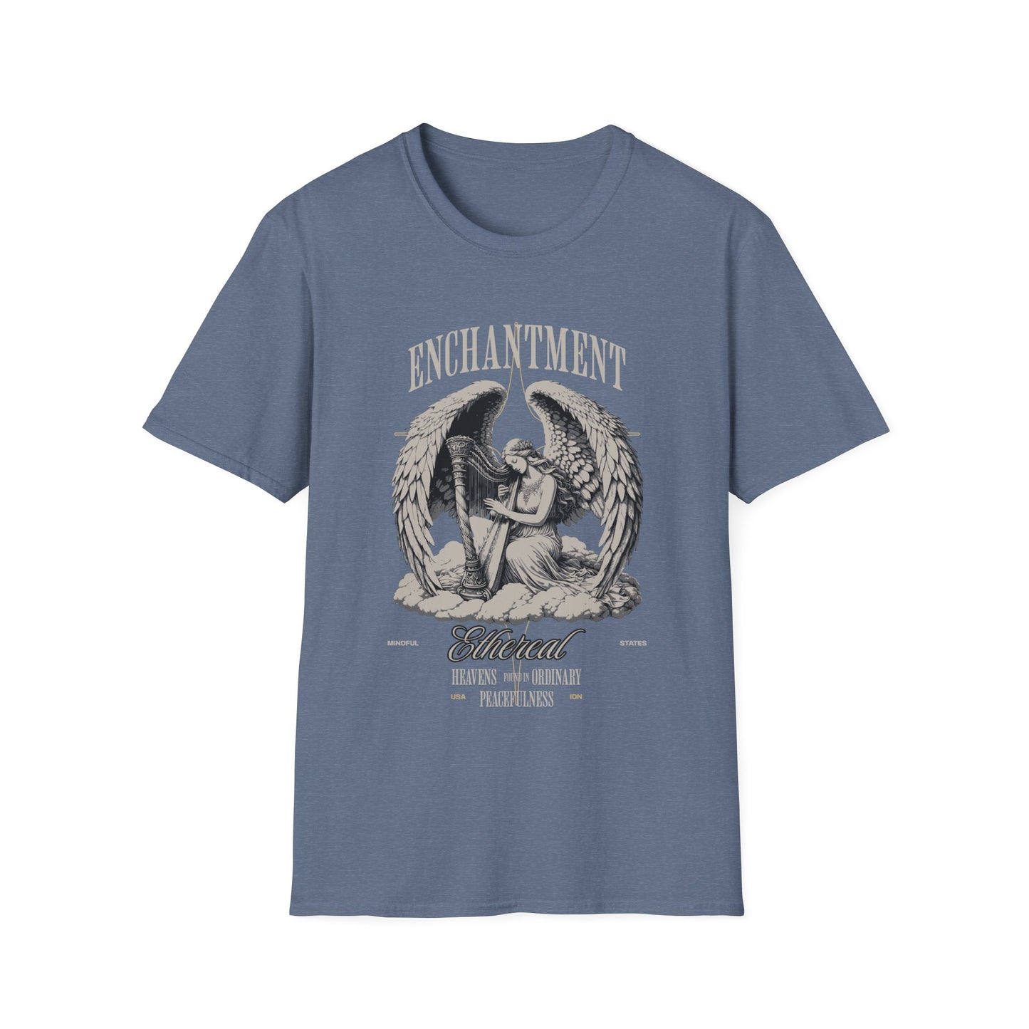 A denim blue unisex t-shirt with a graphic print of an angel on the front, with the words 'Enchantment' .