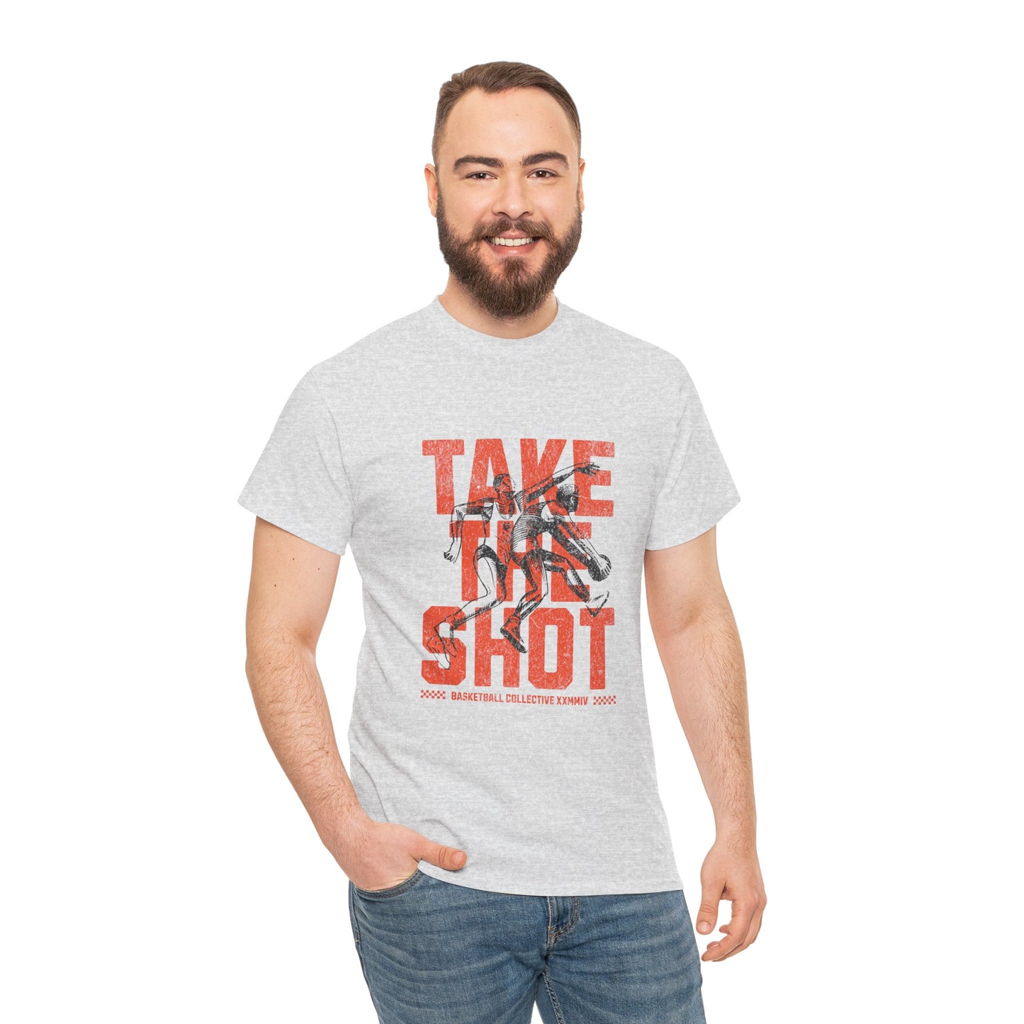 A man wearing a sport grey t-shirt with a basketball player silhouette and the text 'Take the shot' printed in orange.