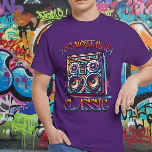 Person wearing a purple t-shirt with a colorful graphic design in front of a graffiti wall.