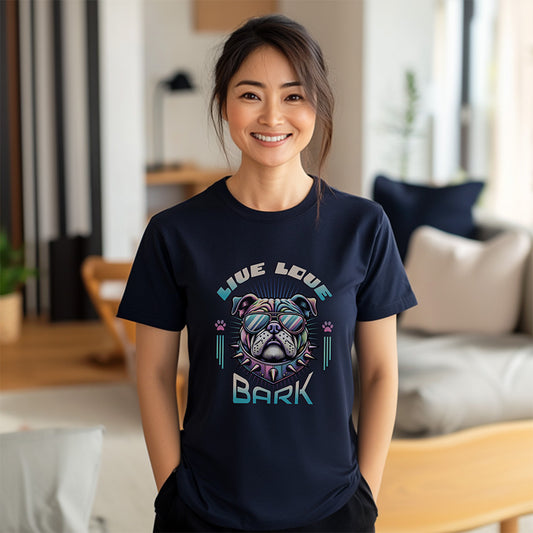 Woman wearing a black t-shirt with a graphic design and text in a living room.