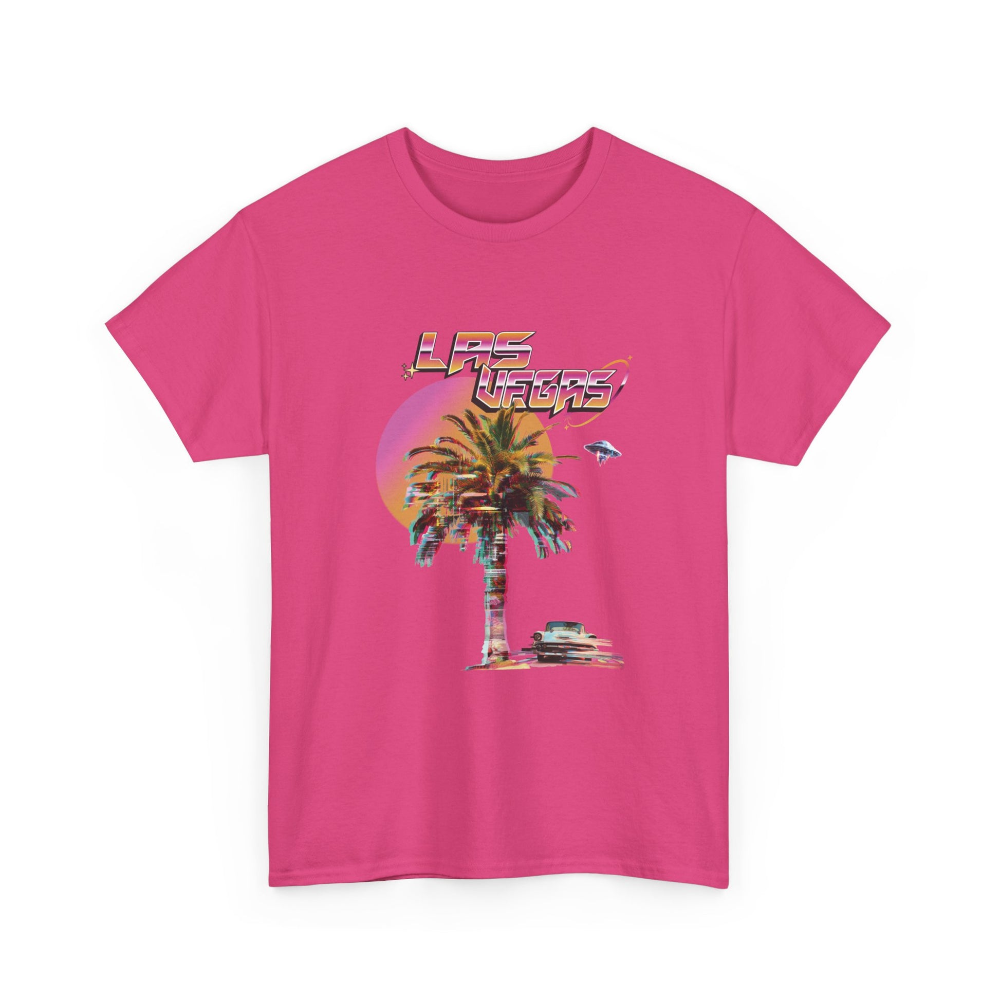 A heliconia pink t-shirt with a retro Las Vegas glitch graphic featuring a palm tree, a sunset, and UFOs over a desert landscape.