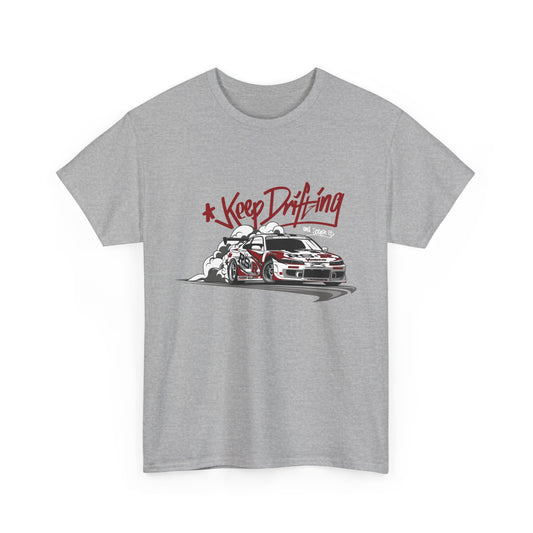 A gray t-shirt with the text 'Keep Drifting' and a graphic of a car drifting on a street.