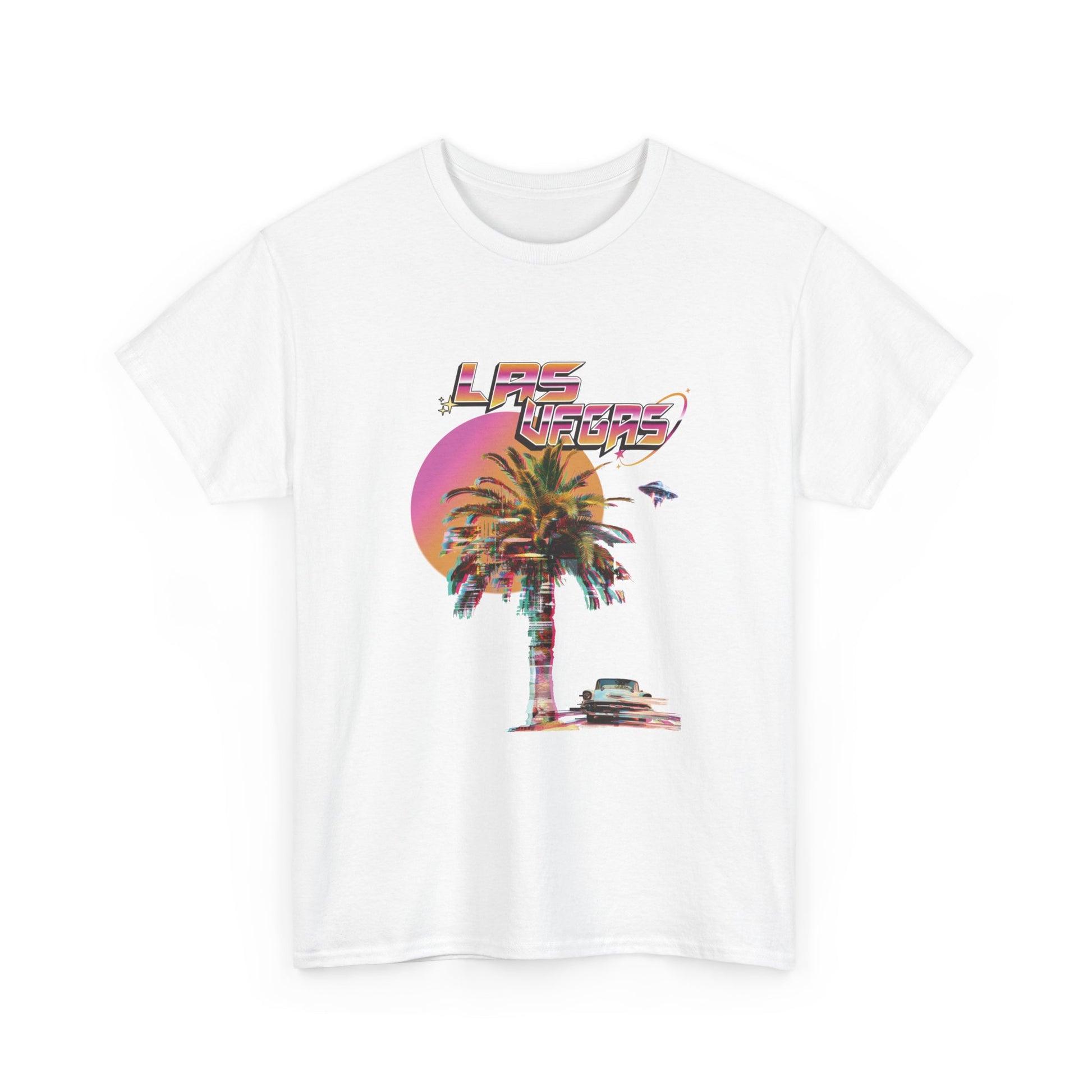 A white t-shirt with a Las Vegas retro glitch graphic featuring a palm tree, a sunset, and UFOs over a desert landscape.