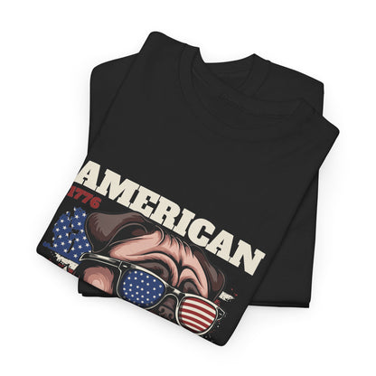 A folded black t-shirt with a white graphic design of a pug dog and text that reads "American 1776"