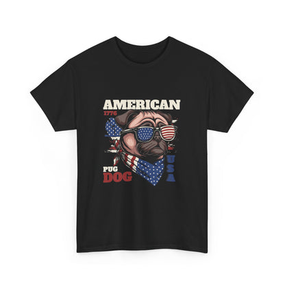 A black Gildan 5000 short-sleeve crewneck t-shirt featuring a patriotic graphic of a pug dog wearing sunglasses with an American flag pattern and a red, white, and blue bandana. The graphic includes the text 'AMERICAN 1776' and 'PUG DOG USA'.