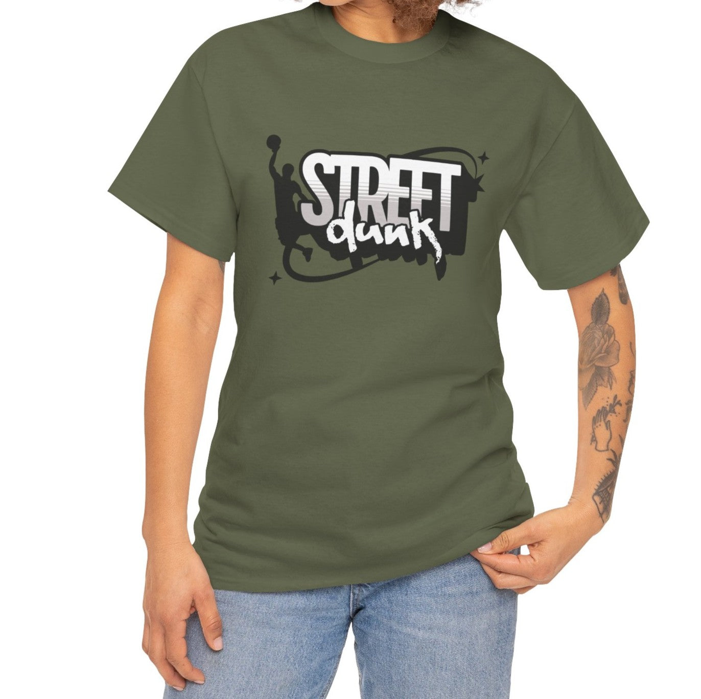 A person wearing a military green  graphic t-shirt with a black and white 'Street Dunk' basketball logo. Sporty  urban clothing style, perfect for hoops culture and casual athletic wear.