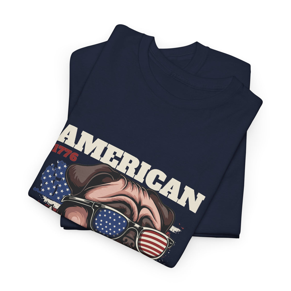 A folded navy blue t-shirt with a white graphic design of a pug dog and text that reads "American 1776"
