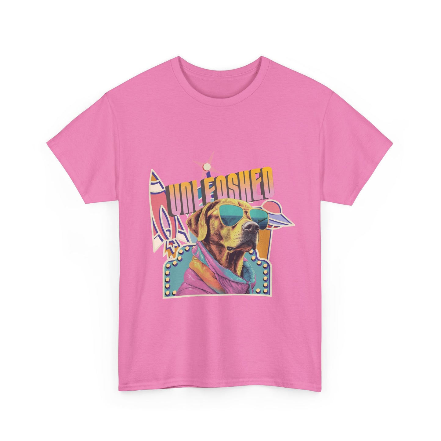 pink t-shirt with a colorful vintage spaceship graphic of a dog wearing sunglasses and text that reads 'Unleashed'.