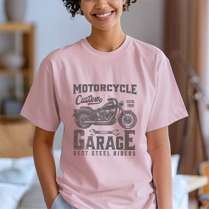 Person wearing a pink t-shirt with a motorcycle graphic and text.