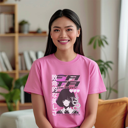 Woman wearing a pink t-shirt with graphic design and text, sitting in a room with plants and a bookshelf.