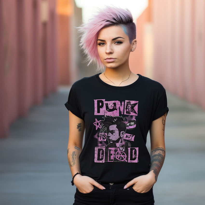 A person wearing a black t-shirt with pink graphic design that says 'Punk is not dead'.