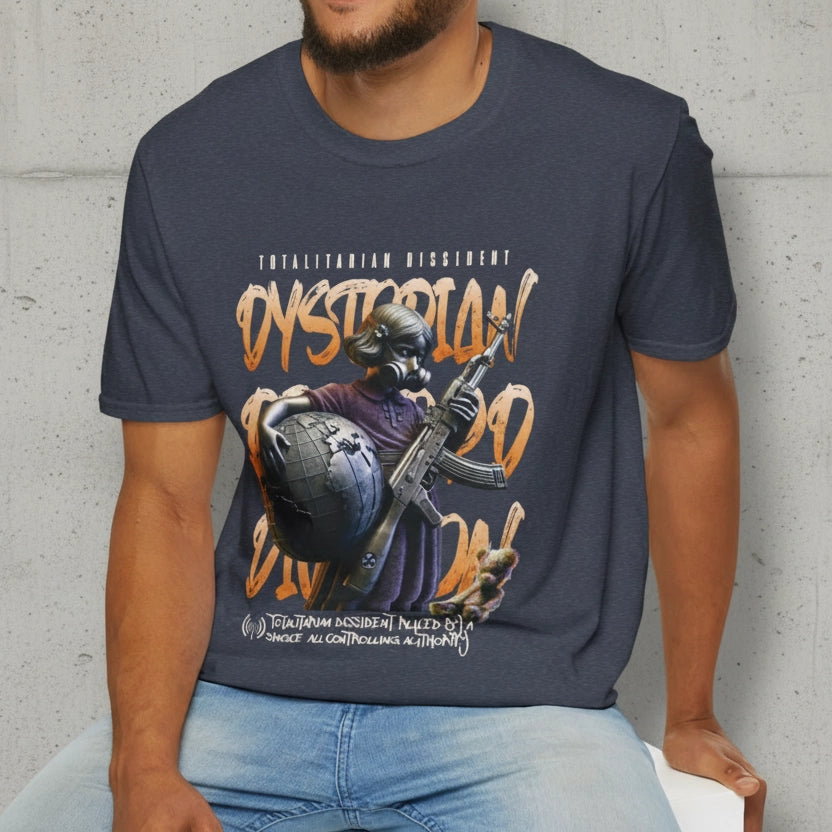 A man wearing a  heather navy dystopian streetwear tee showing a tactical gas-masked figure against a fractured world map with "Dystopian" and "Totalitarian Dissident" typography in a gritty, industrial aesthetic.