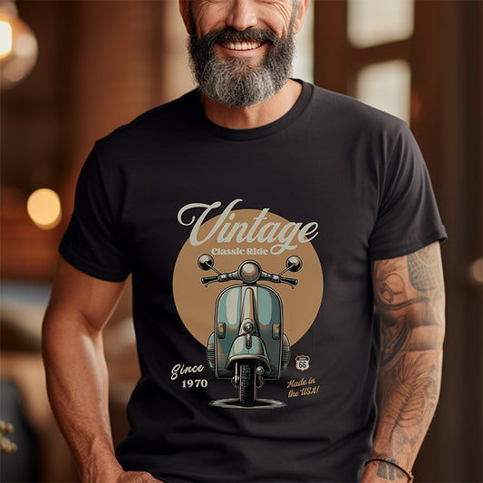 Man wearing a black t-shirt with a vintage scooter graphic and text.