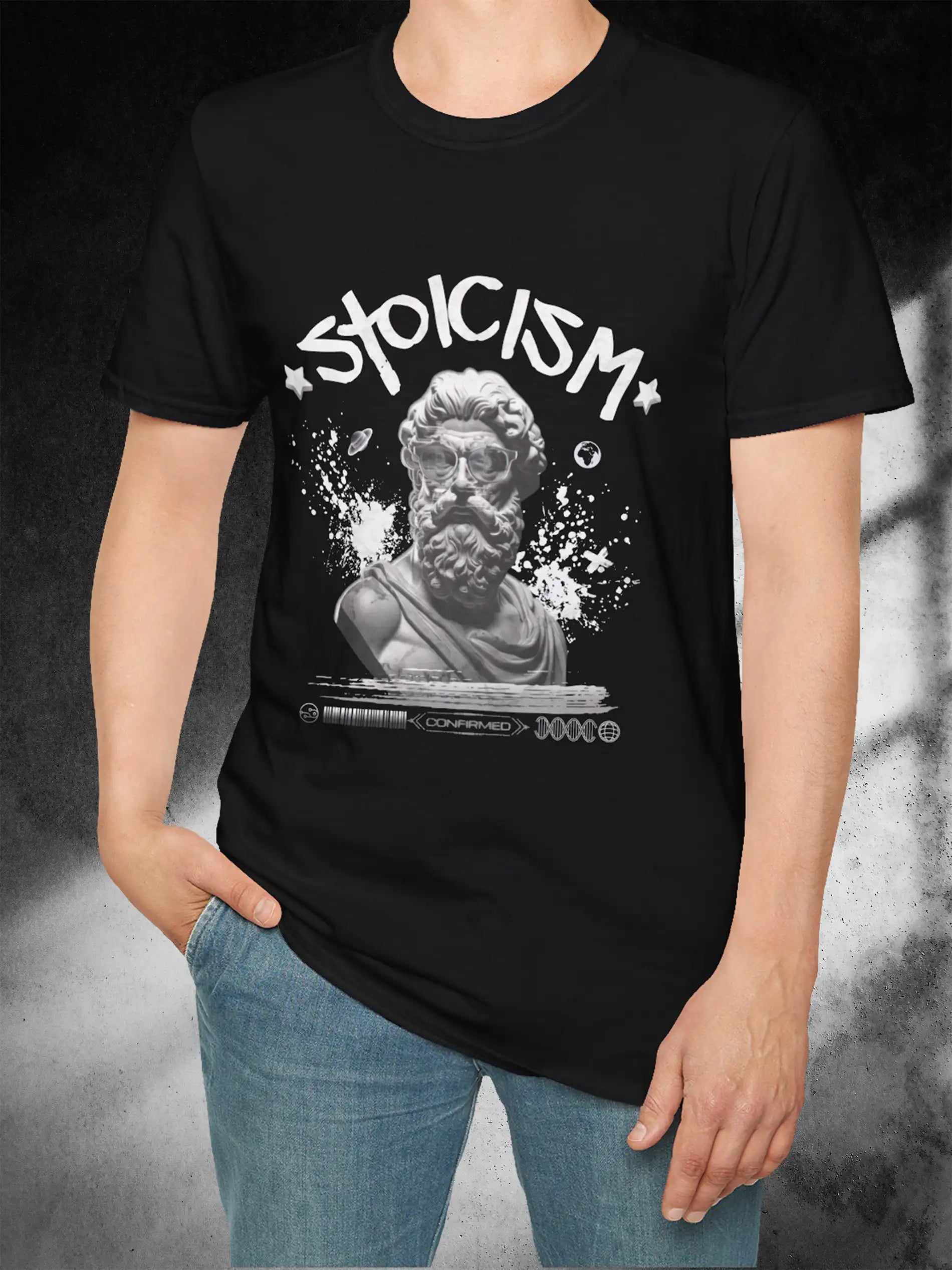 A man wearing a black t-shirt with a Greek style bust with celestial elements and the text "Stoicism" .